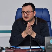 طاهر اولوچ