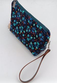 کیف لوازم بند‌چرمی (انار چاپ) تیره گل‌گلی